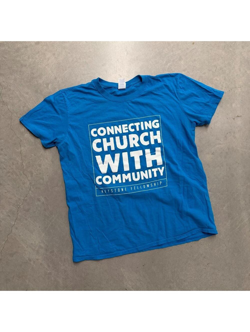 Y2K Men's Connecting Church With Community Blue Spellout Tee Sized Large